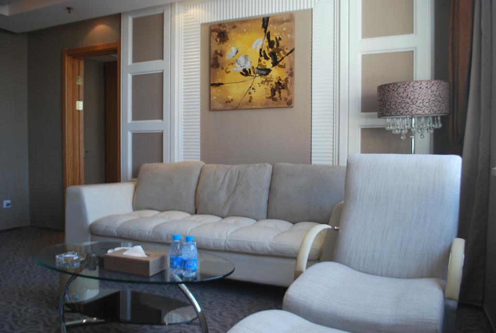 The Center Hotel Weihai Quarto foto