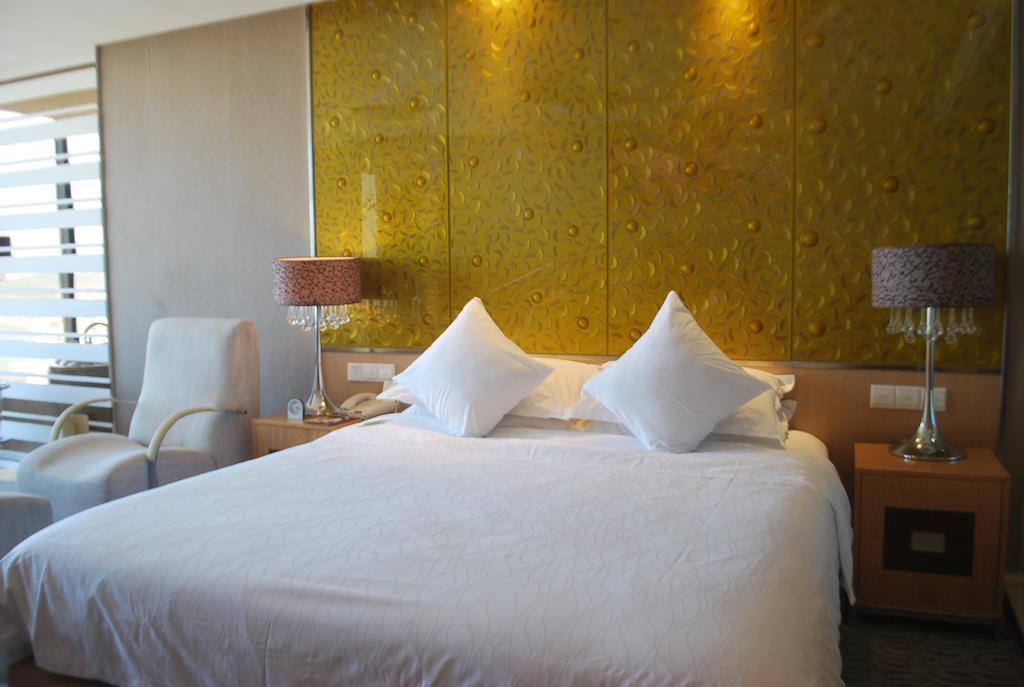 The Center Hotel Weihai Quarto foto