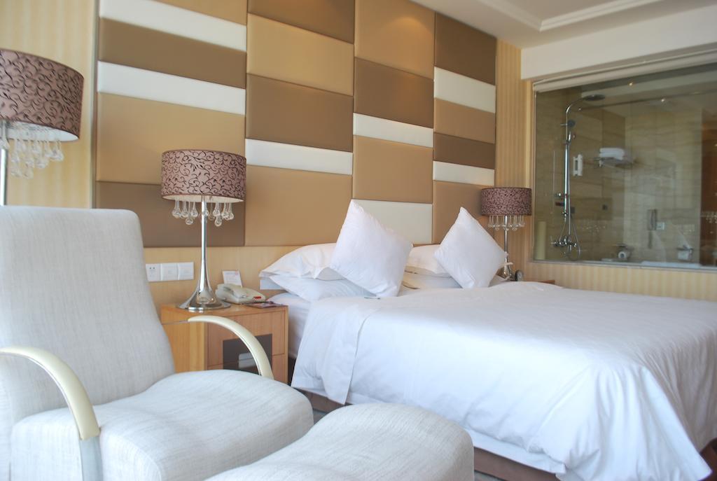 The Center Hotel Weihai Quarto foto