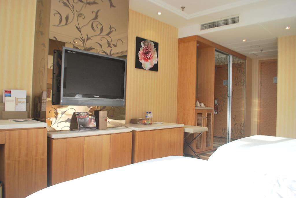 The Center Hotel Weihai Quarto foto